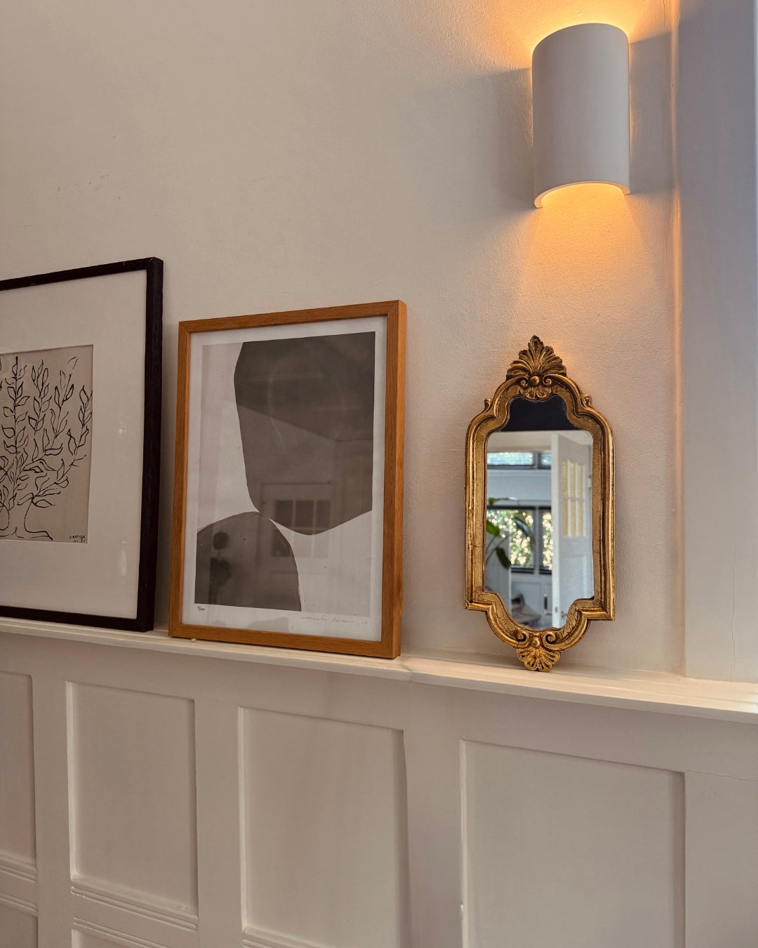 Vintage wandspiegel met ornamentlijst