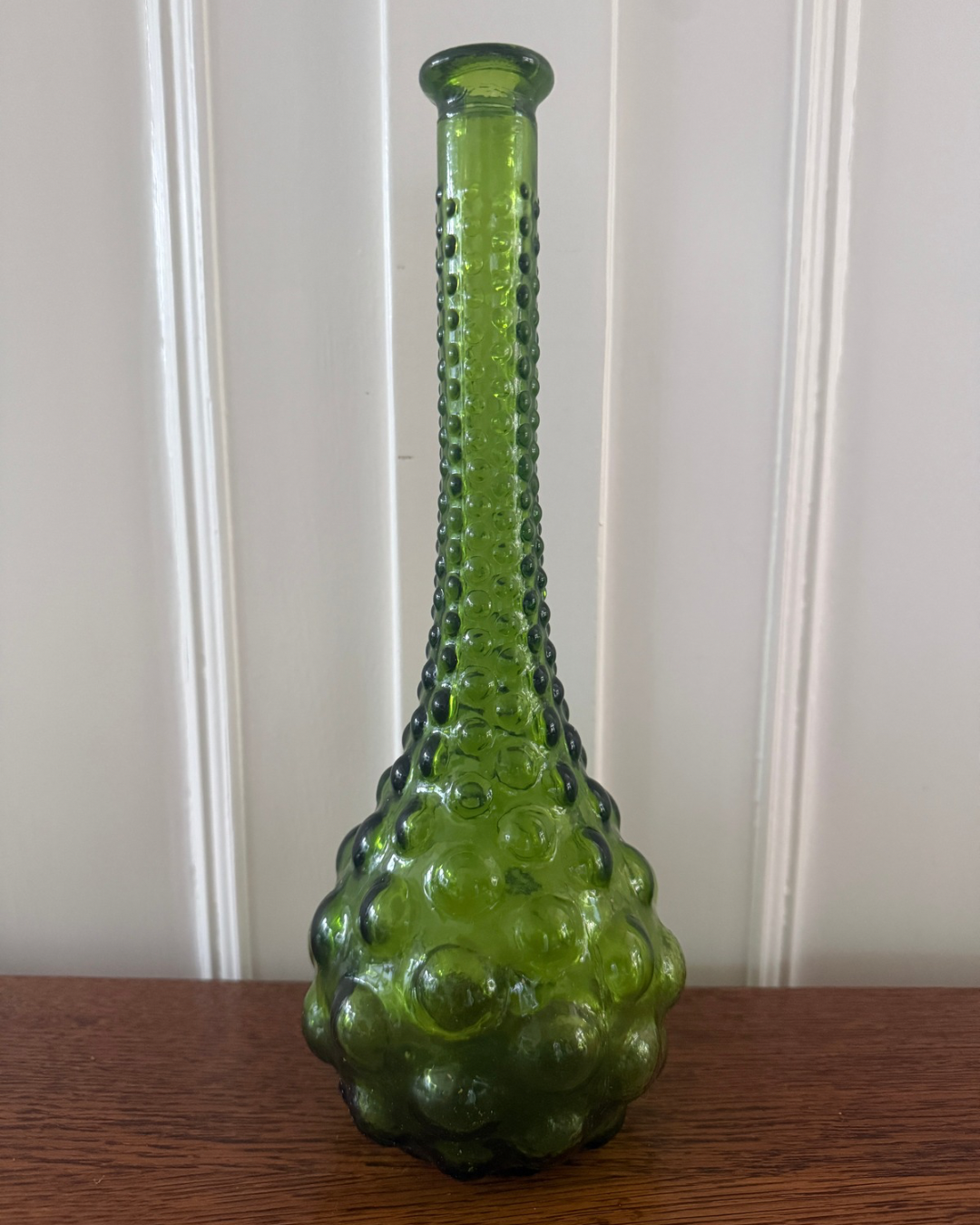 Vintage groene glazen vaas met noppen