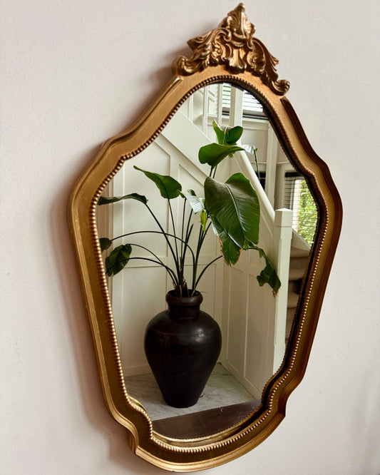 Rijk gedecoreerde vintage spiegel met goudkleurige lijst